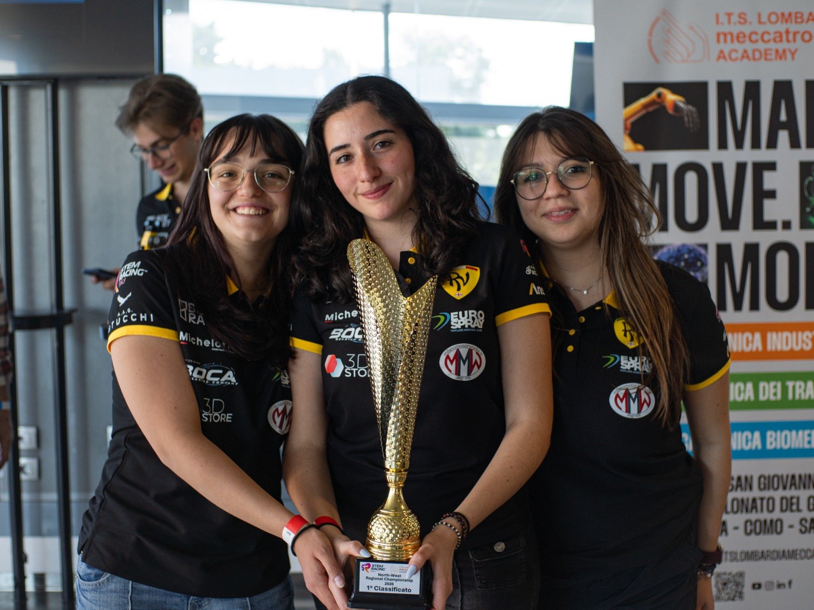Trophy in hand.